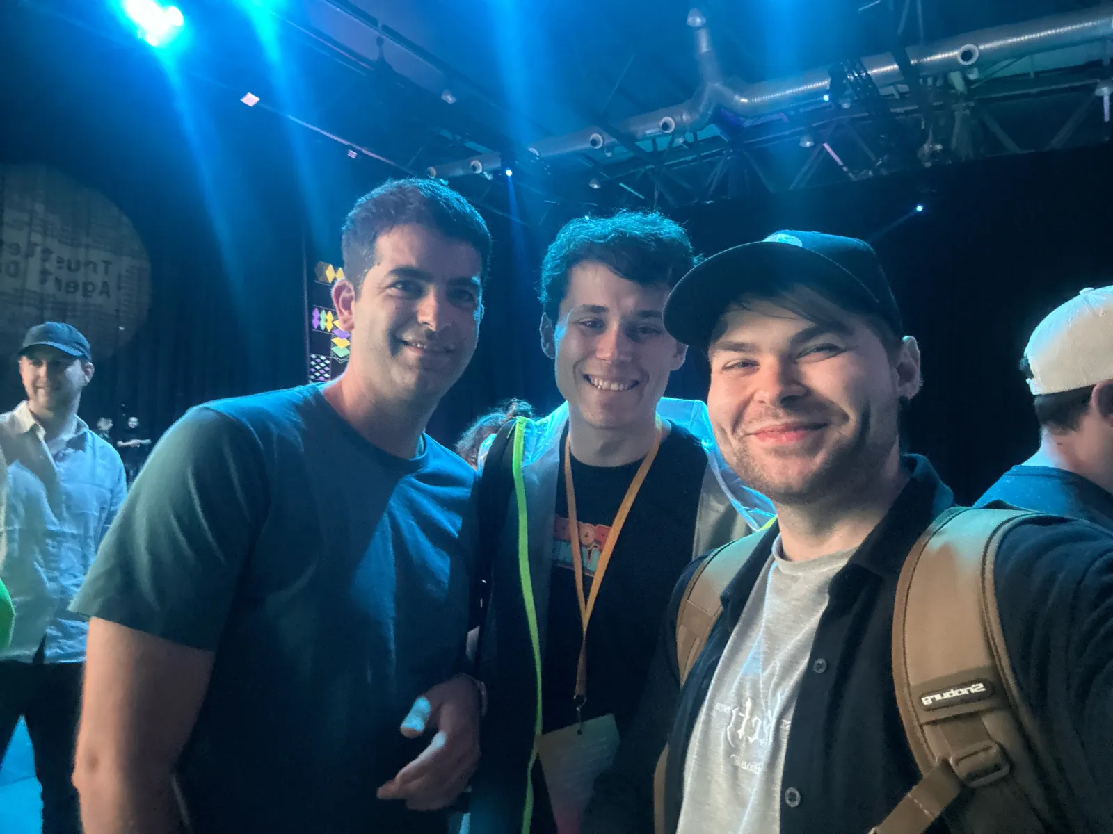 Selfie with people from the Ethereum Foundation in front of the main stage
