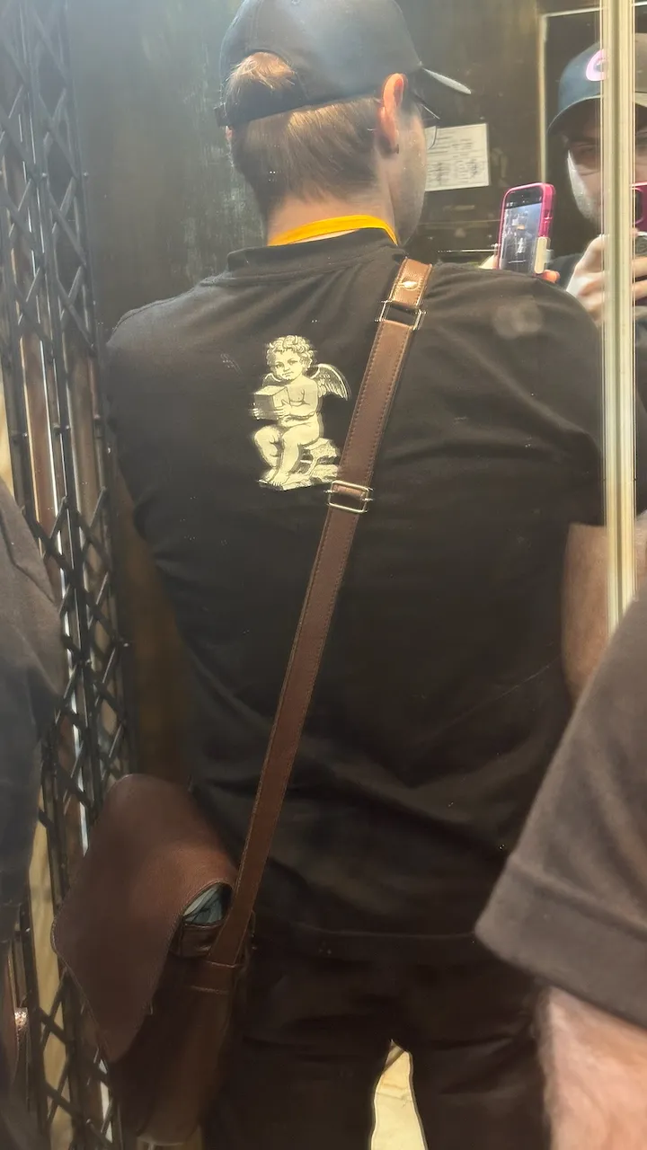 The back of the Geth T-shirt with a cherub holding a cube